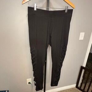 Torrid Black leggings with cutout sides